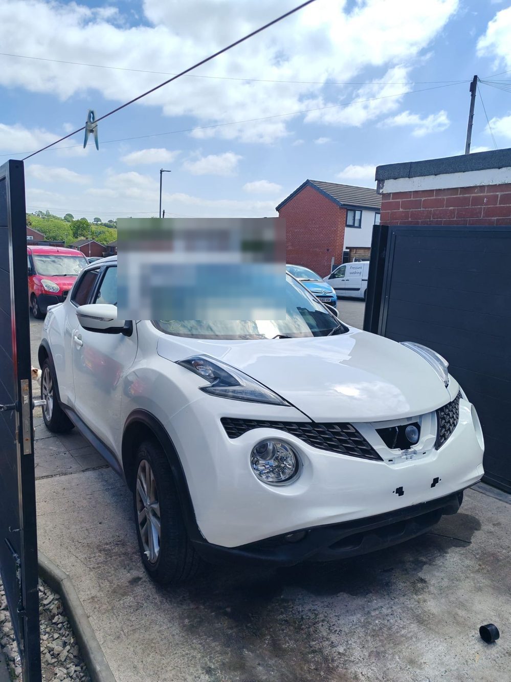 The same Nissan Juke with the front end rebuilt and resprayed