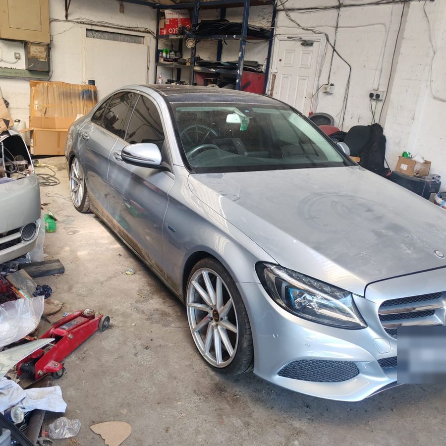 Repaired Mercedes C-Class back on its wheels in the workshop